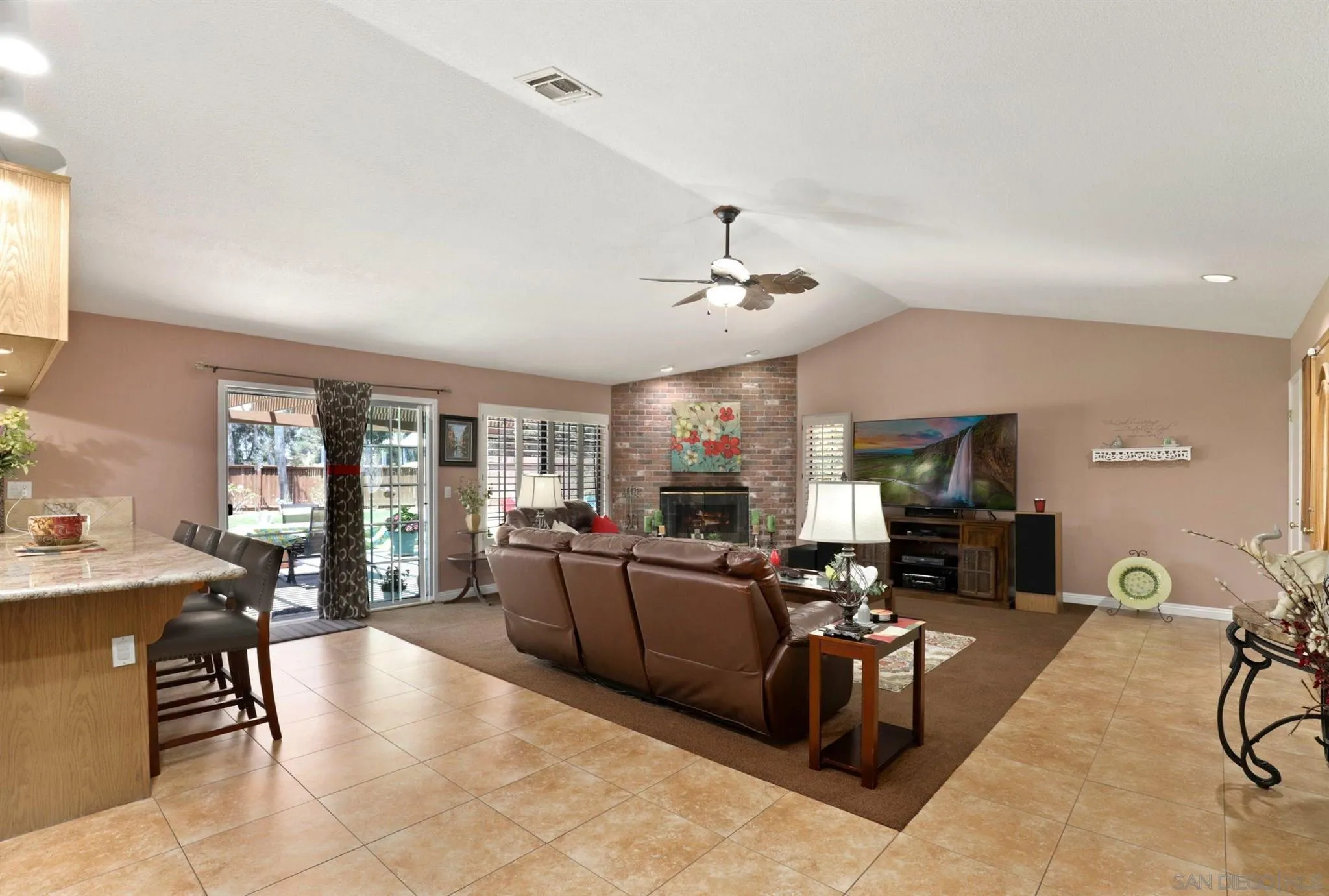 910 Redbud Road Chula Vista, CA 91910 - Photo 3 of 33 a living room with furniture and a large window
