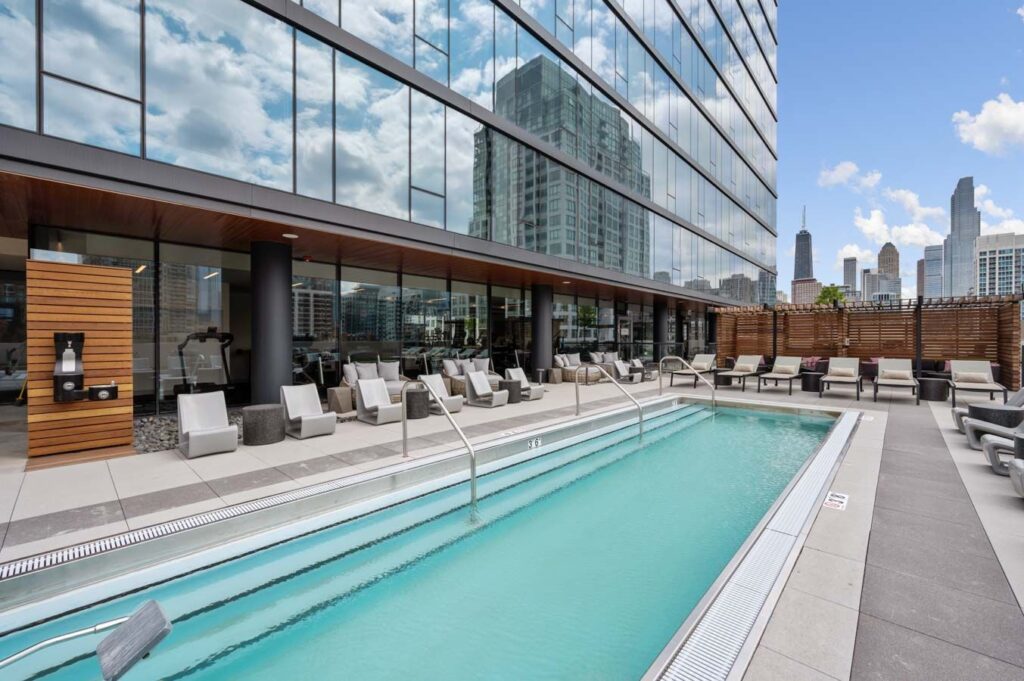 808 North Cleveland Avenue, Unit 1608 Chicago, IL 60610 - Photo 18 of 20 a view of a swimming pool with outdoor seating