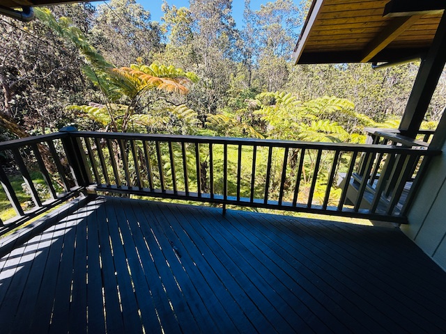 11-3763 10th Street Volcano, HI 96785 - Photo 21 of 28 a view of balcony with wooden floor