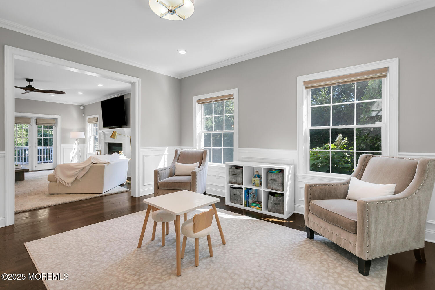 19 Old Phalanx Road Lincroft, NJ 07738 - Photo 14 of 34 a living room with furniture wooden floor and a large window