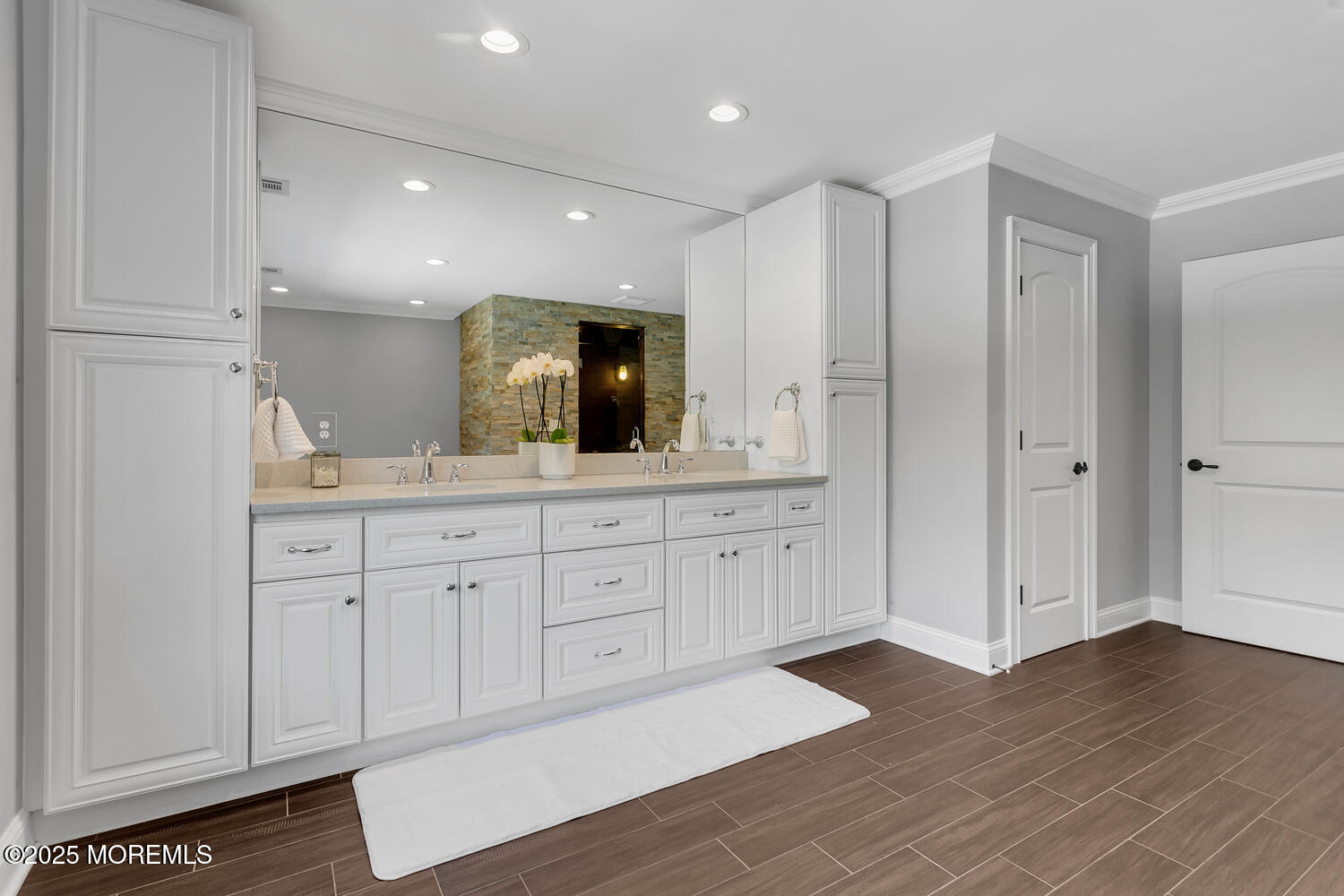 19 Old Phalanx Road Lincroft, NJ 07738 - Photo 18 of 34 a spacious bathroom with a sink a mirror and a shower