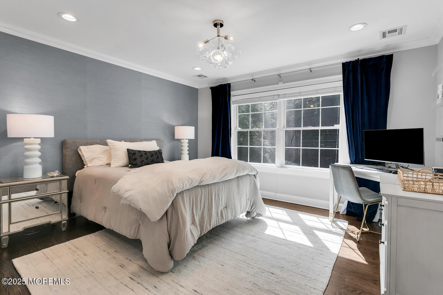 19 Old Phalanx Road Lincroft, NJ 07738 - Photo 20 of 34 a spacious bedroom with a large bed and a flat tv screen on dresser
