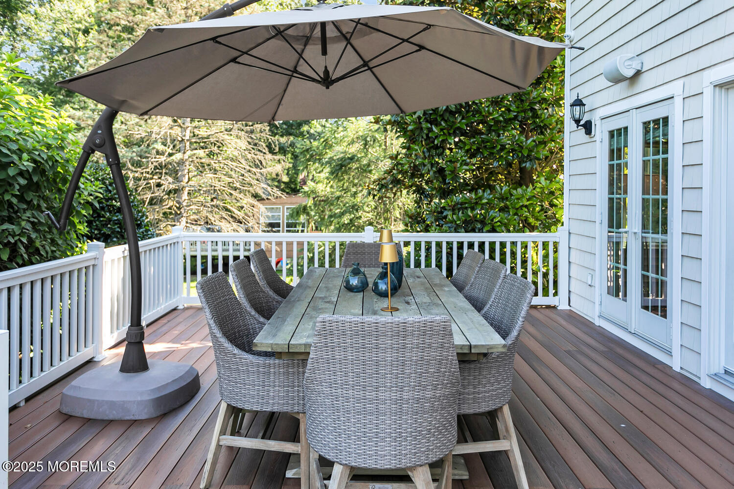 19 Old Phalanx Road Lincroft, NJ 07738 - Photo 30 of 34 a view of balcony with furniture and umbrella