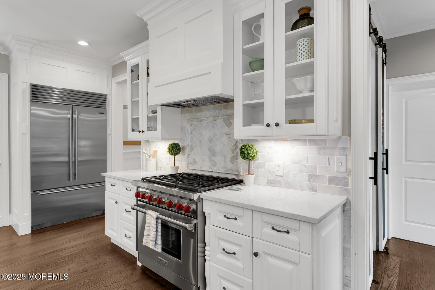 19 Old Phalanx Road Lincroft, NJ 07738 - Photo 8 of 34 a kitchen with stainless steel appliances a stove a refrigerator and cabinets