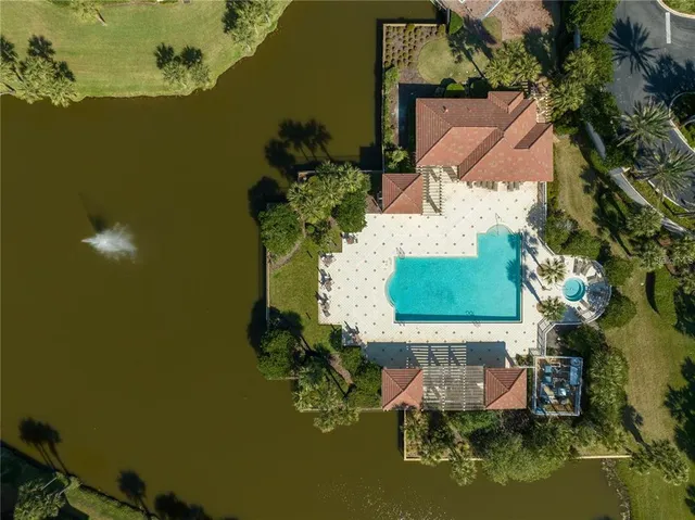 a front view of a house with a garden and porch