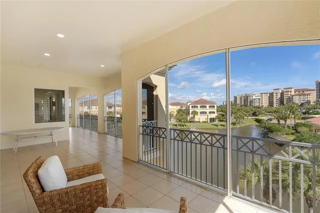 a front view of a house with a yard table and chairs