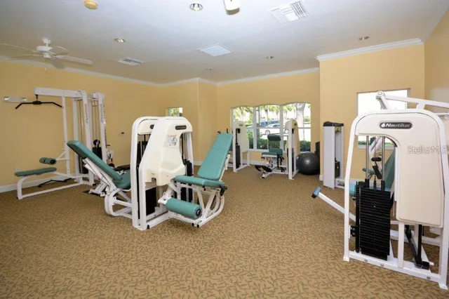 a dining room with furniture and a window