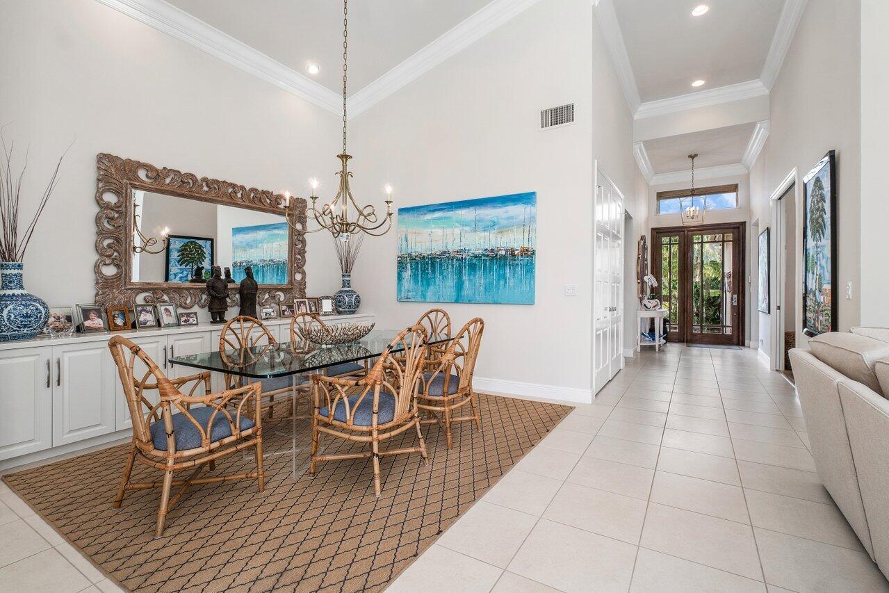 13548 Verde Drive Palm Beach Gardens, FL 33410 - Photo 11 of 43 a view of a dining room with furniture