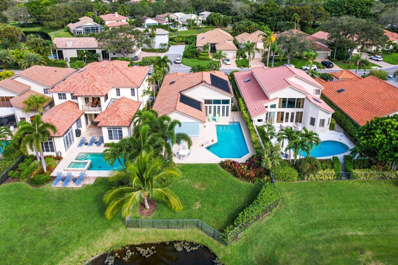 13548 Verde Drive Palm Beach Gardens, FL 33410 - Photo 2 of 43 an aerial view of residential houses with outdoor space and street view