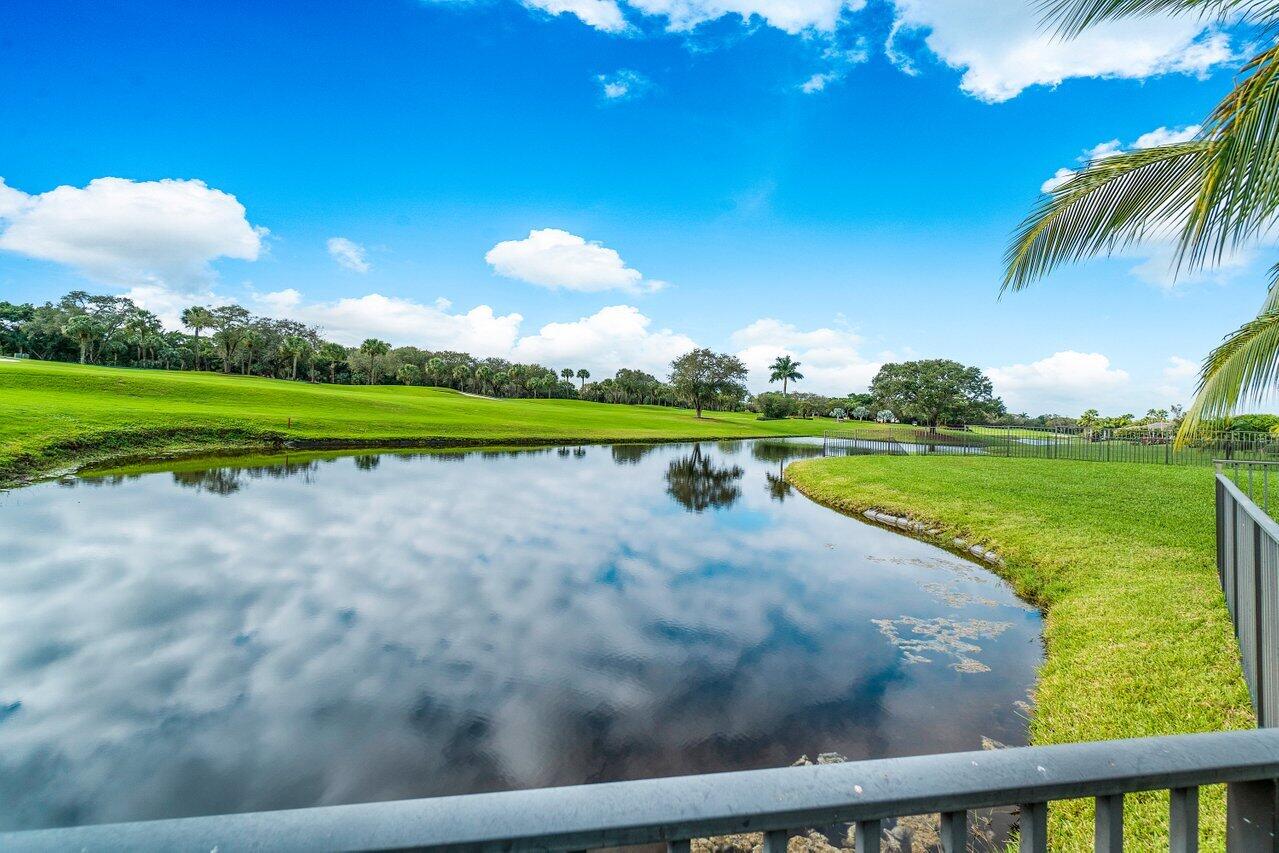 13548 Verde Drive Palm Beach Gardens, FL 33410 - Photo 35 of 43 a view of an outdoor space and a yard