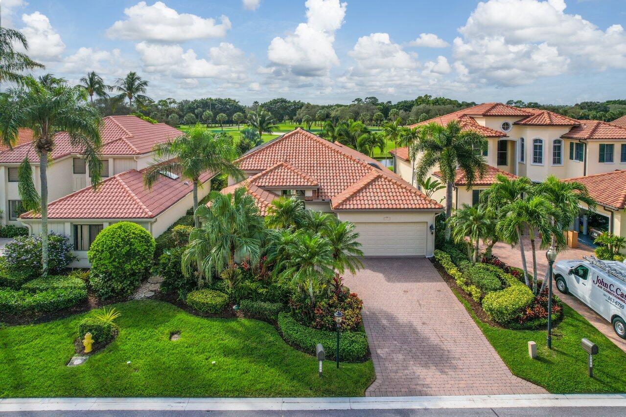 13548 Verde Drive Palm Beach Gardens, FL 33410 - Photo 5 of 43 an aerial view of multiple houses