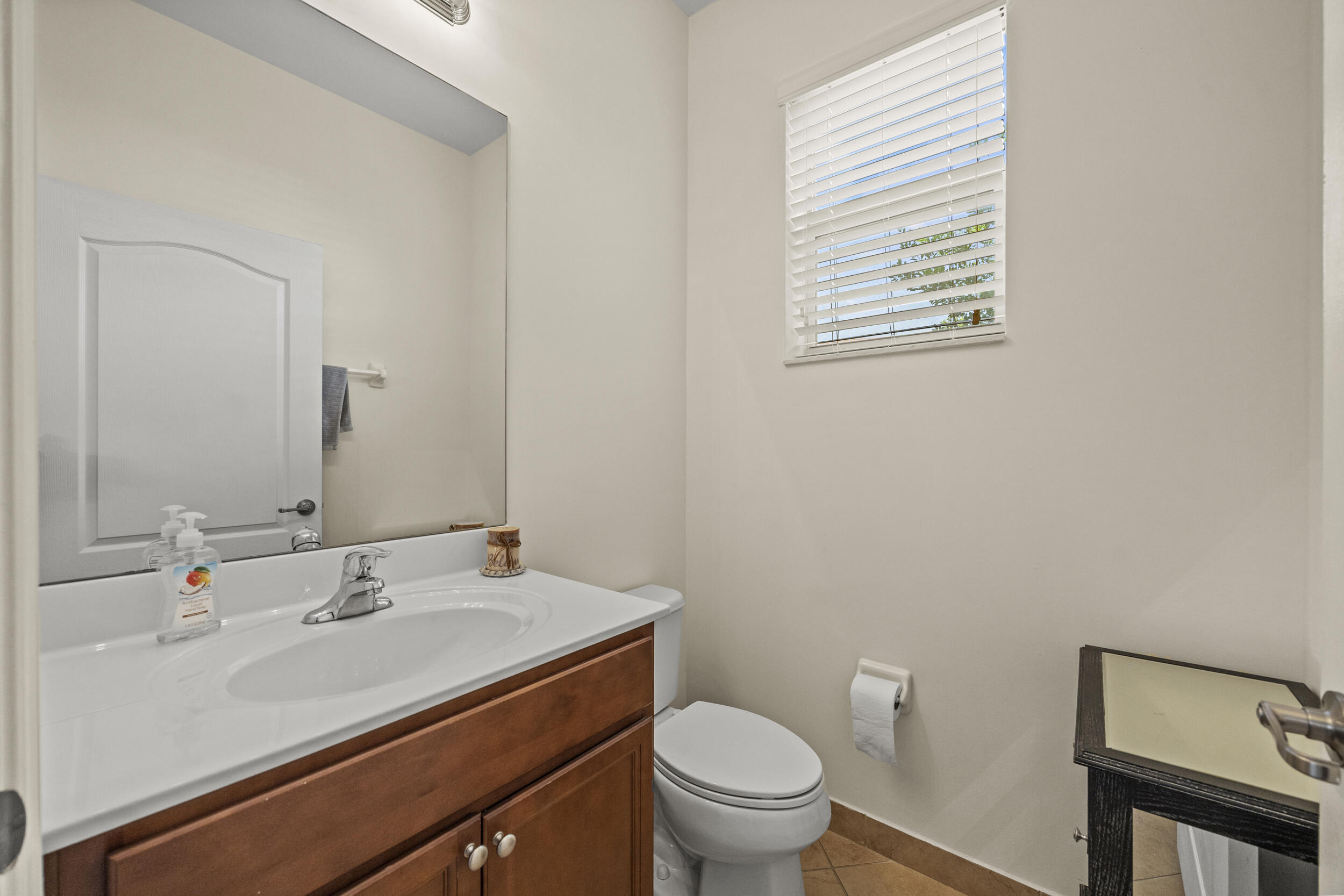 9743 Southwest Purple Martin Way Stuart, FL 34997 - Photo 17 of 38 Half Bathroom