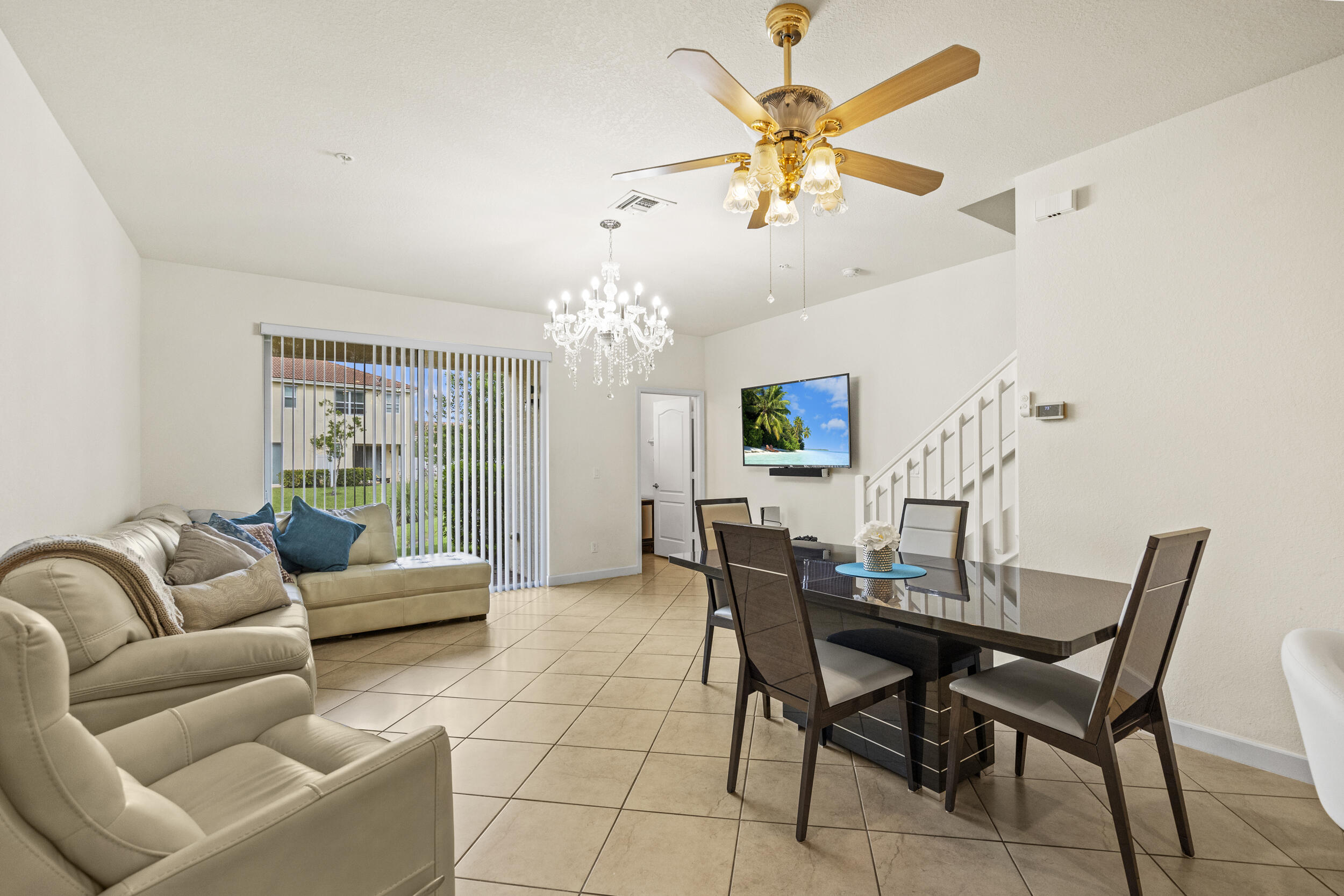 9743 Southwest Purple Martin Way Stuart, FL 34997 - Photo 19 of 38 Dining Room/Living Room