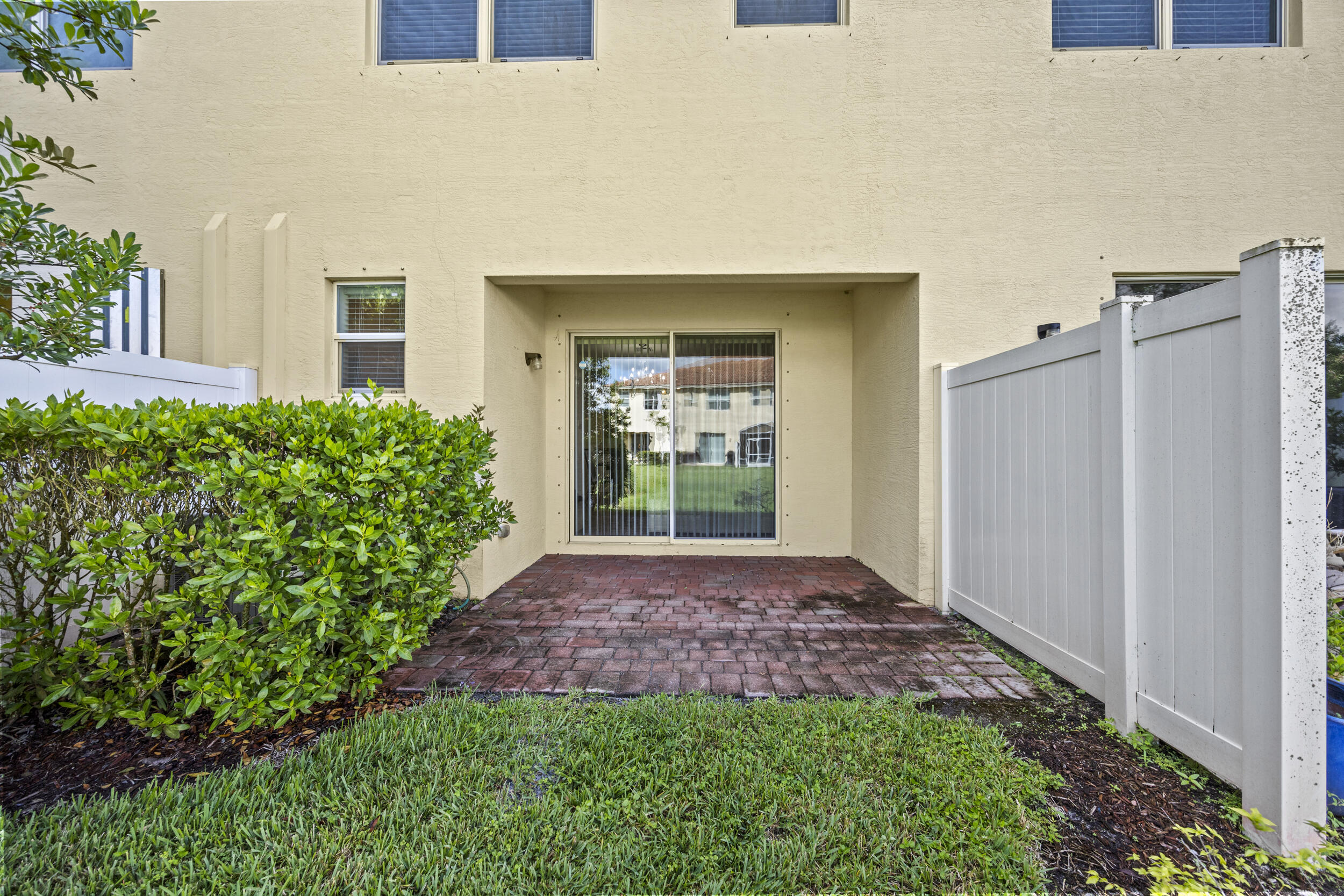 9743 Southwest Purple Martin Way Stuart, FL 34997 - Photo 26 of 38 Extended Paver Patio