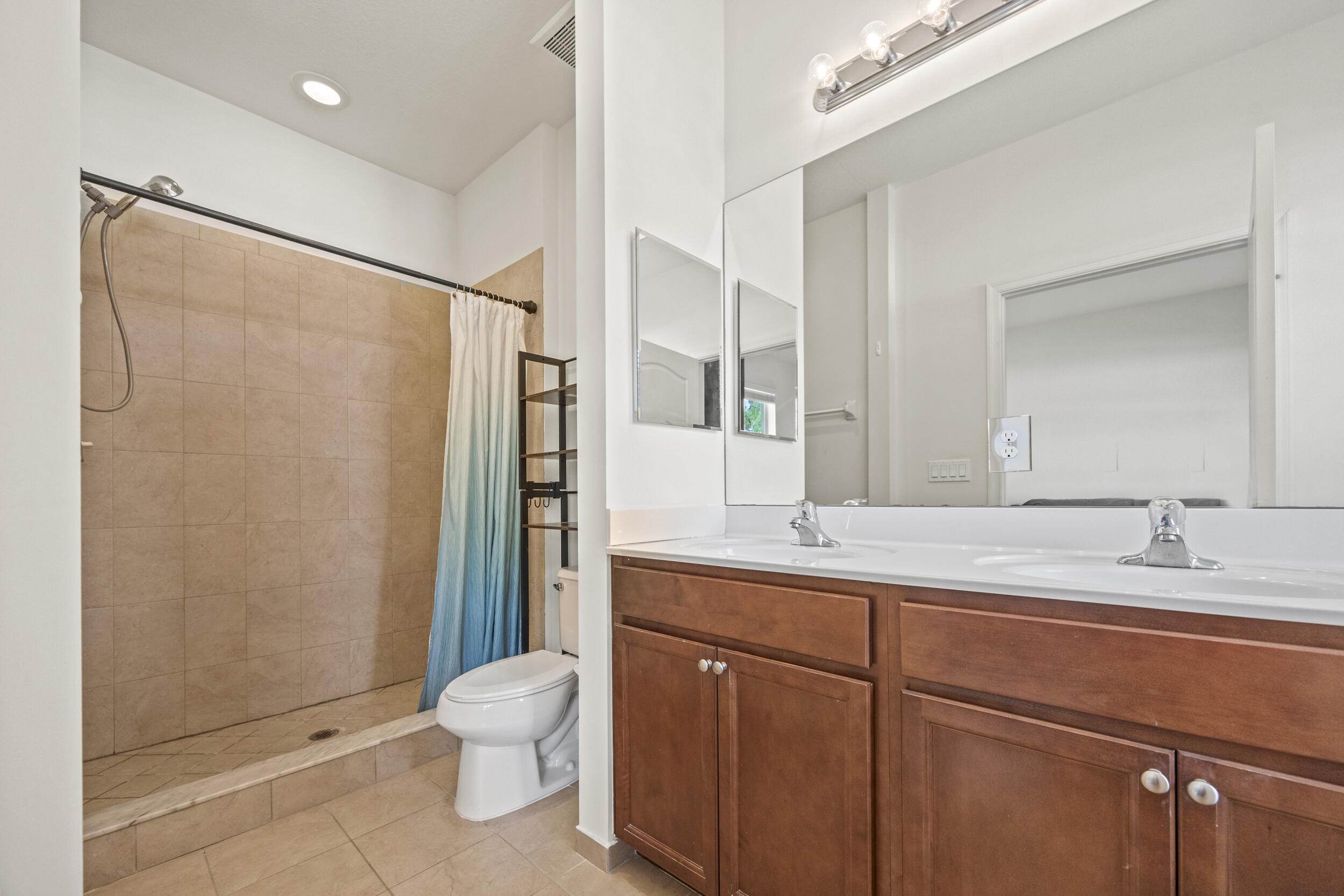 9743 Southwest Purple Martin Way Stuart, FL 34997 - Photo 7 of 38 Primary Bathroom