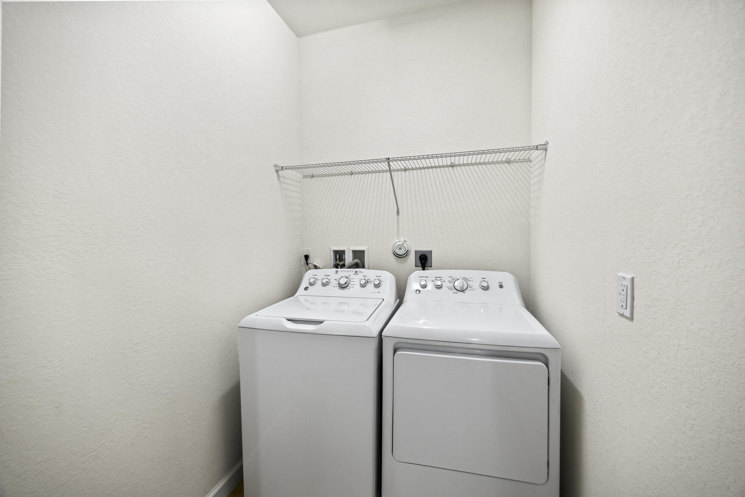 9743 Southwest Purple Martin Way Stuart, FL 34997 - Photo 9 of 38 Upstairs Laundry Room