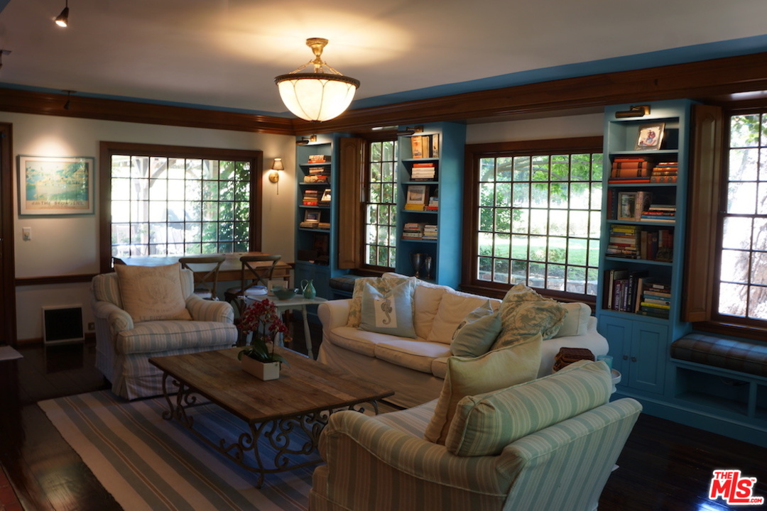 919 Rivas Canyon Road Pacific Palisades, CA 90272 - Photo 6 of 43 a living room with furniture and a large window