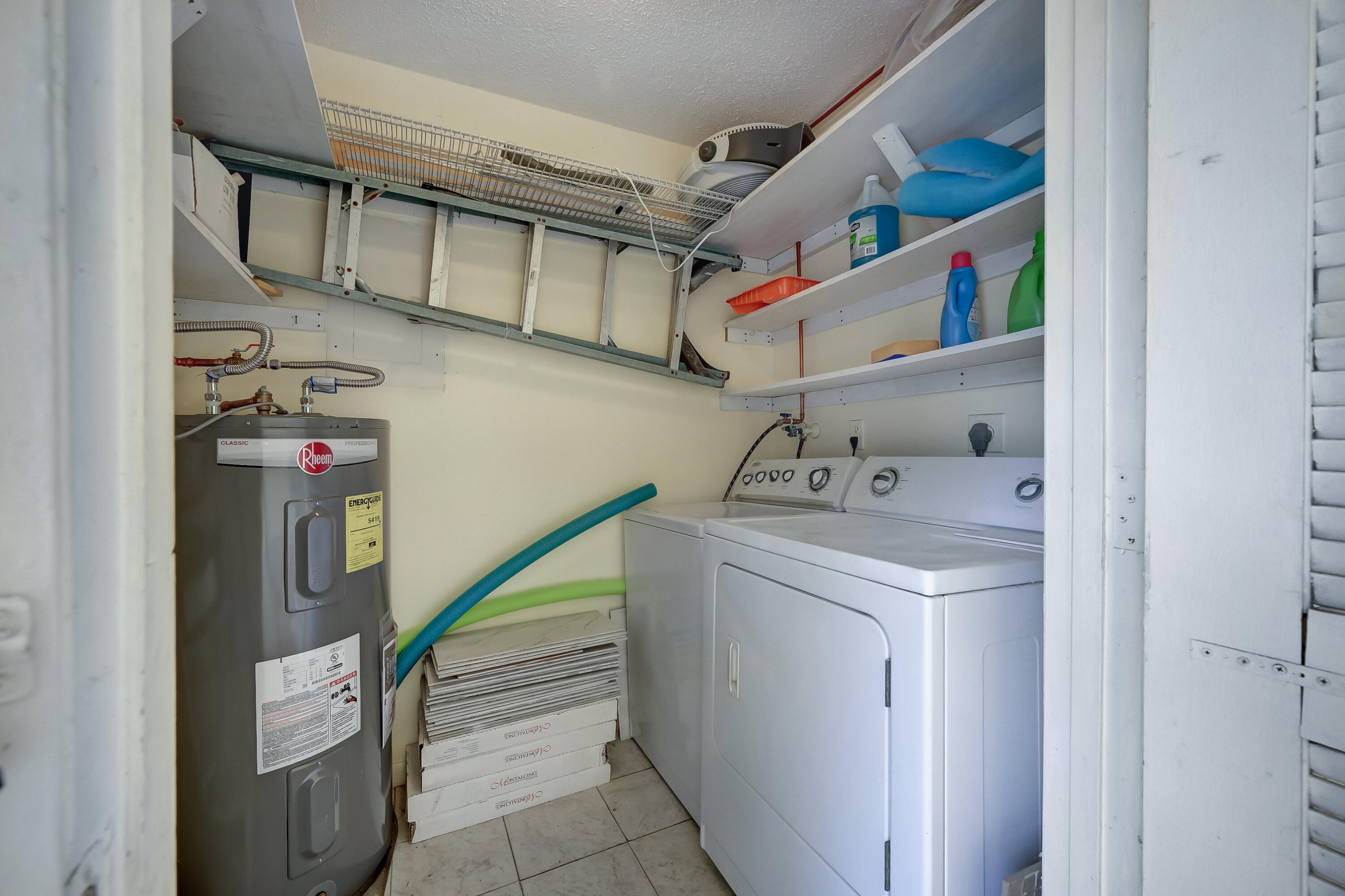 227 Cardinal Lane Delray Beach, FL 33445 - Photo 26 of 38 a utility room with dryer and washer
