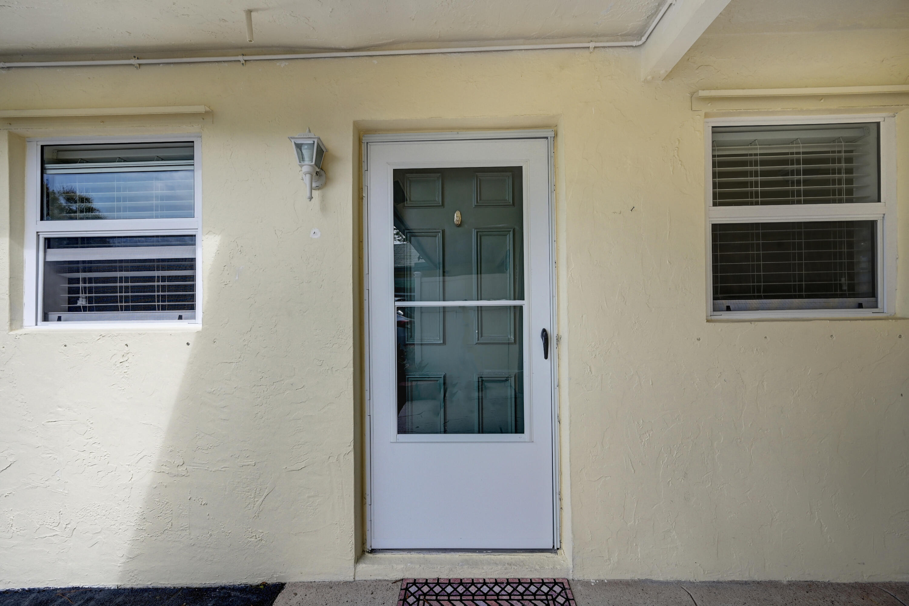 227 Cardinal Lane Delray Beach, FL 33445 - Photo 3 of 38 a view of a door of the house
