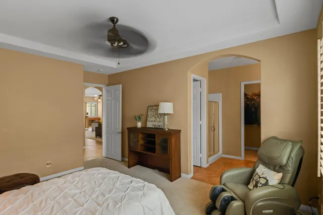 a bedroom with a bed and furniture