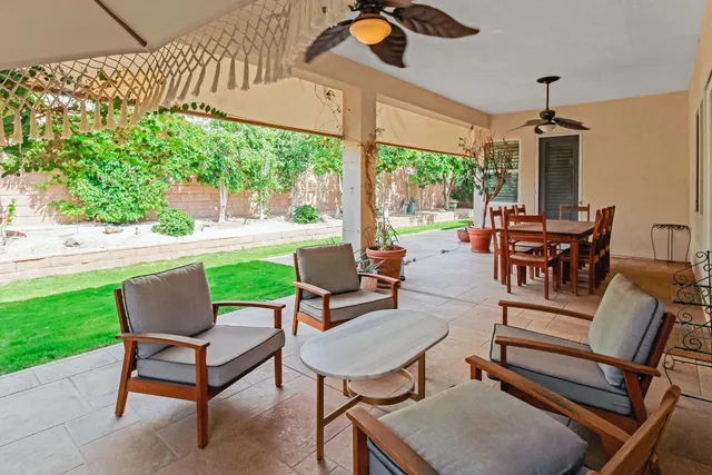 a building outdoor space with patio furniture