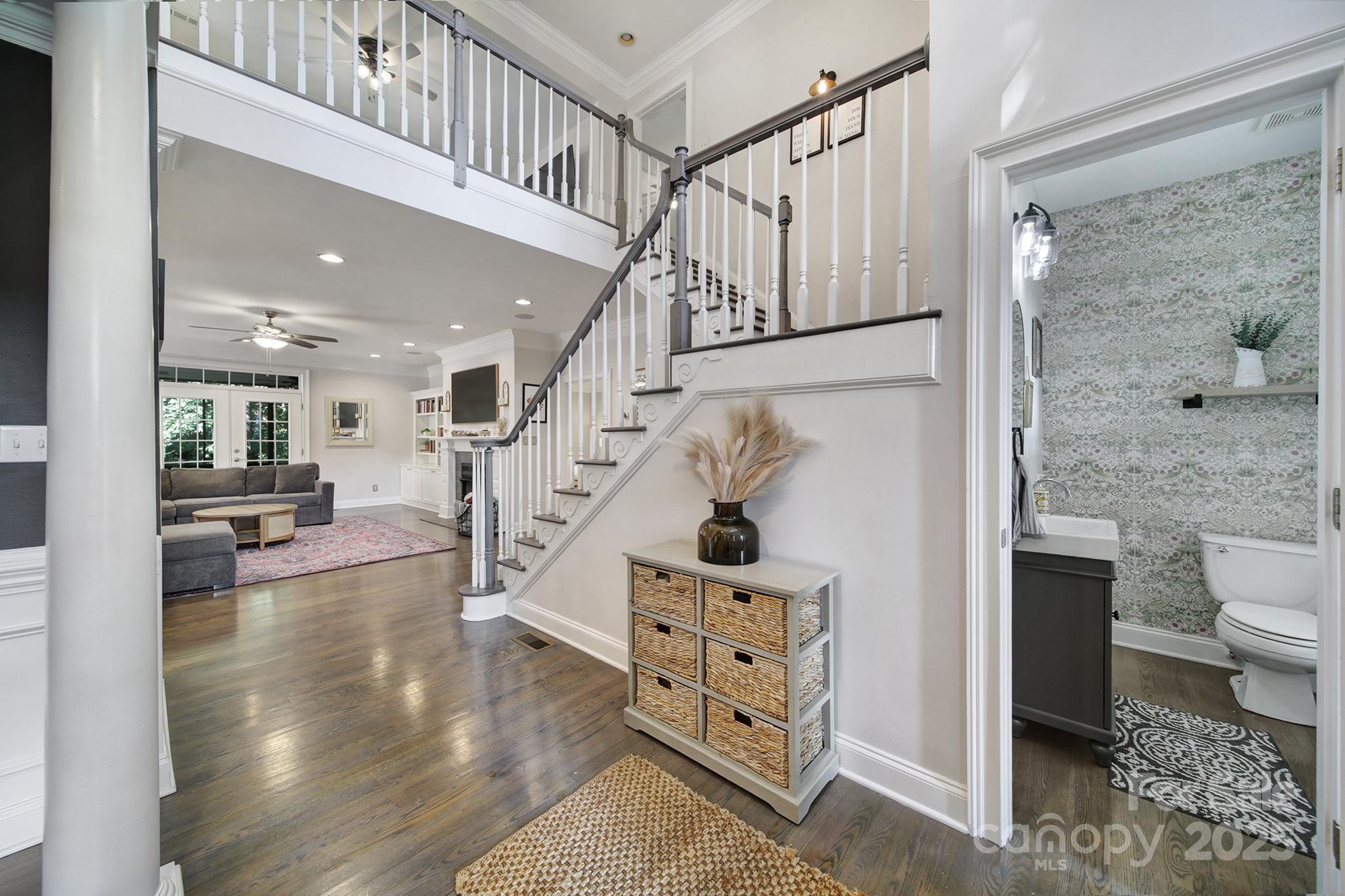 1674 Caille Court Fort Mill, SC 29708 - Photo 3 of 43 a view of entryway livingroom and hall with wooden floor