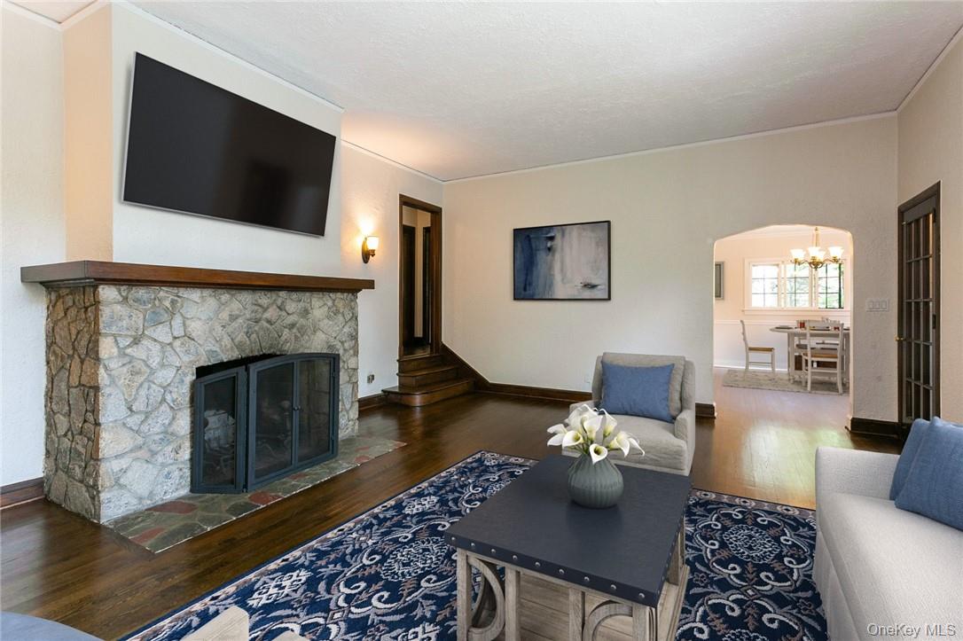 1191 Post Road Scarsdale, NY 10583 - Photo 1 of 1 a living room with furniture and a fireplace
