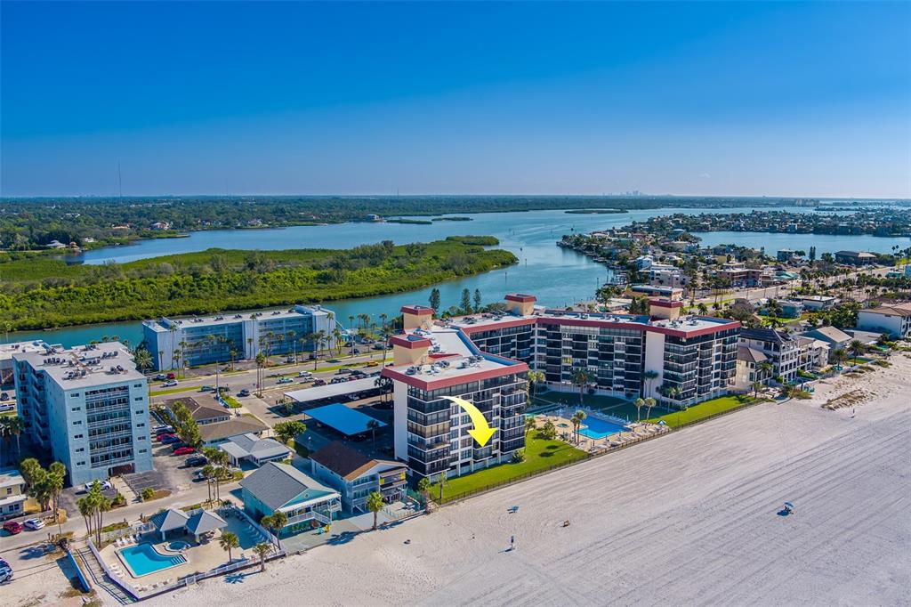 18304 Gulf Boulevard, Unit 102 Redington Shores, FL 33708 - Photo 42 of 55 a view of a terrace with outdoor seating and city view
