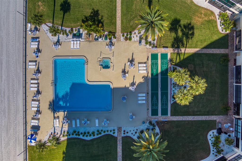 18304 Gulf Boulevard, Unit 102 Redington Shores, FL 33708 - Photo 51 of 55 swimming pool view with a outdoor seating space