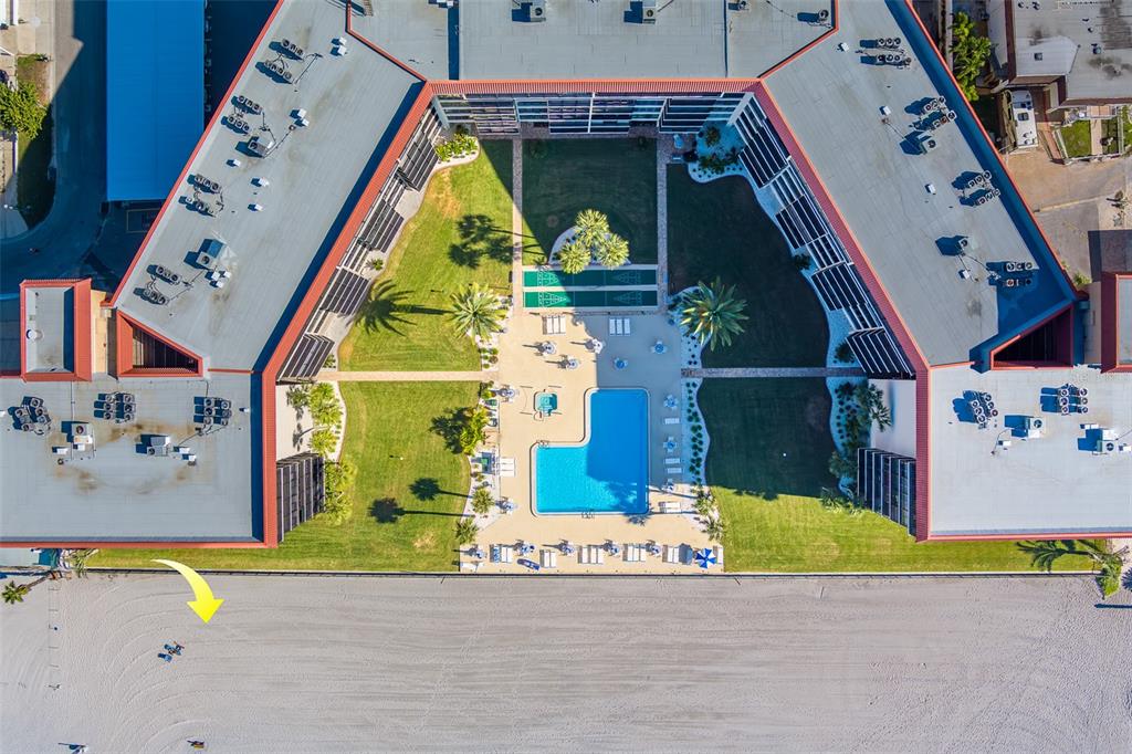 18304 Gulf Boulevard, Unit 102 Redington Shores, FL 33708 - Photo 55 of 55 an aerial view of a house with a swimming pool