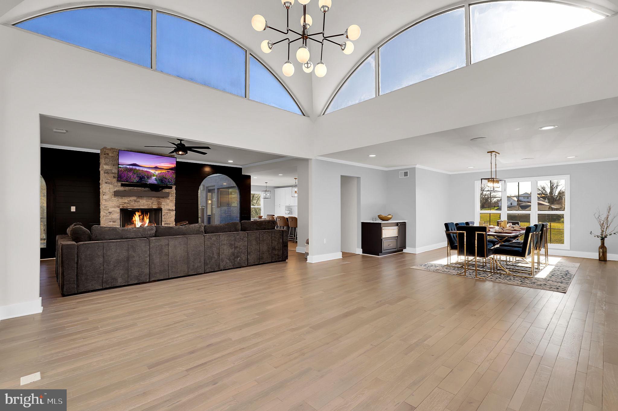 2919 Davidsonville Road Davidsonville, MD 21035 - Photo 13 of 63 a living room with furniture and a chandelier
