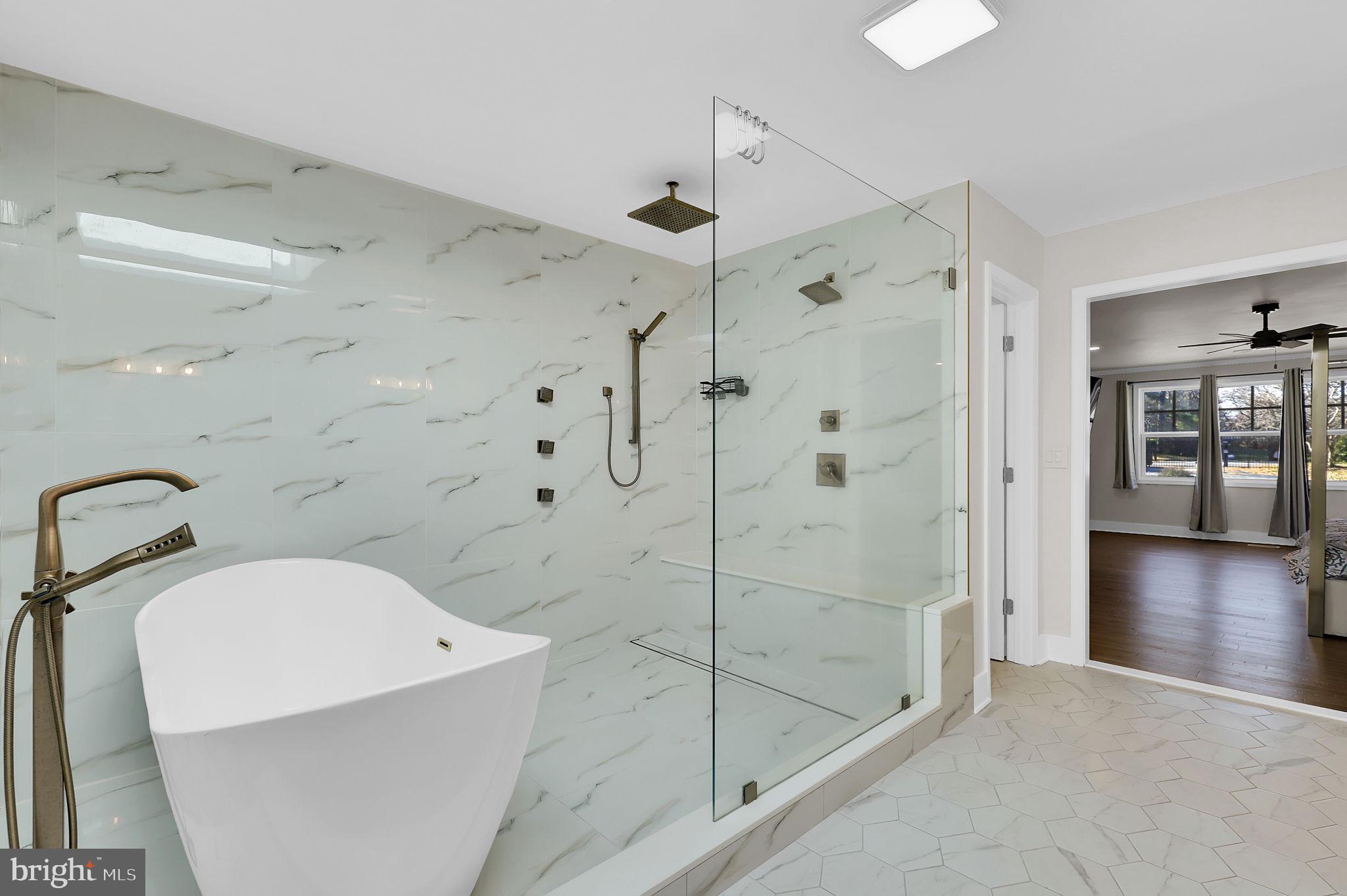 2919 Davidsonville Road Davidsonville, MD 21035 - Photo 30 of 63 a bathroom with a shower and bathtub