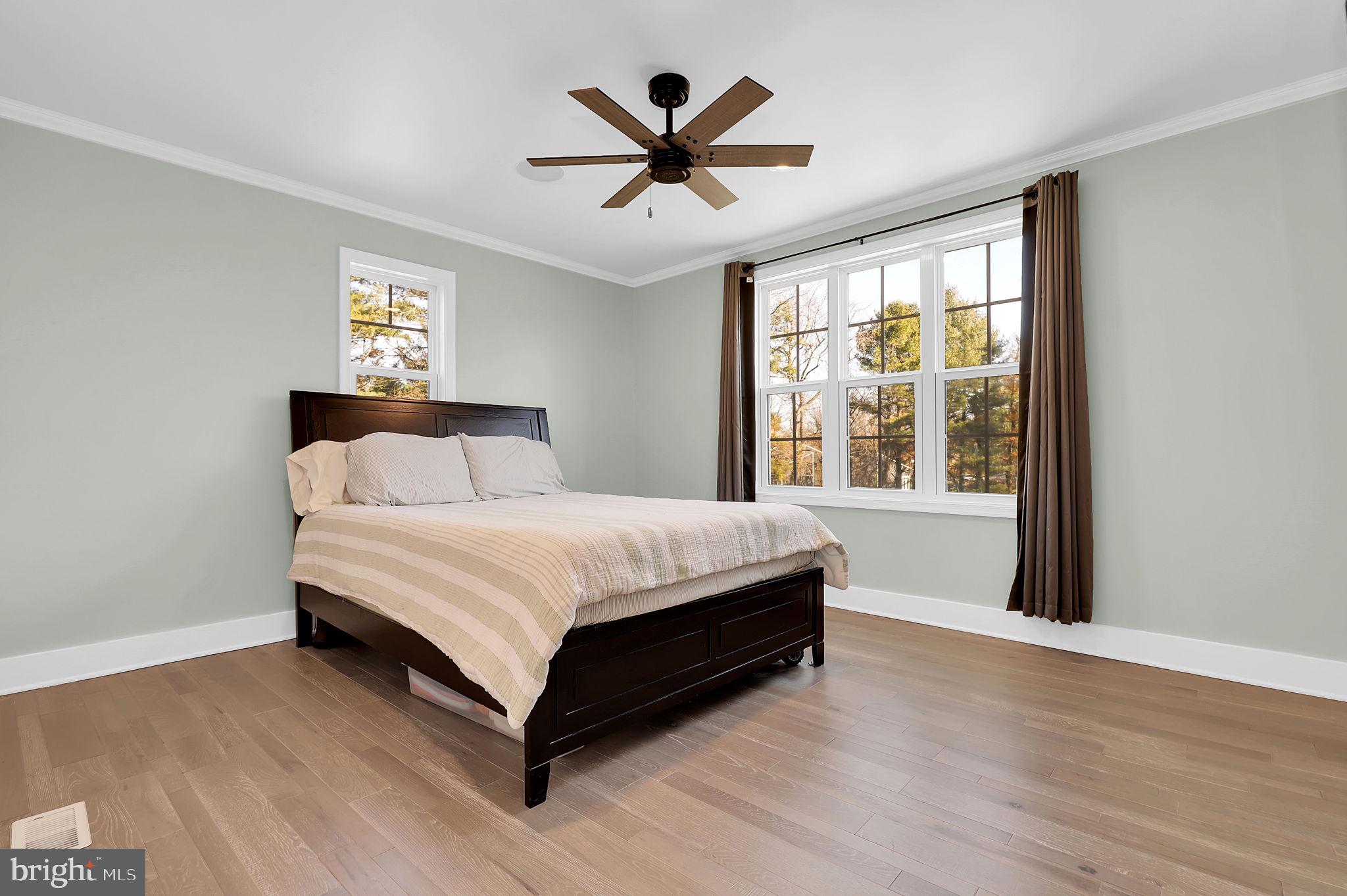 2919 Davidsonville Road Davidsonville, MD 21035 - Photo 36 of 63 a bedroom with a bed and a large window