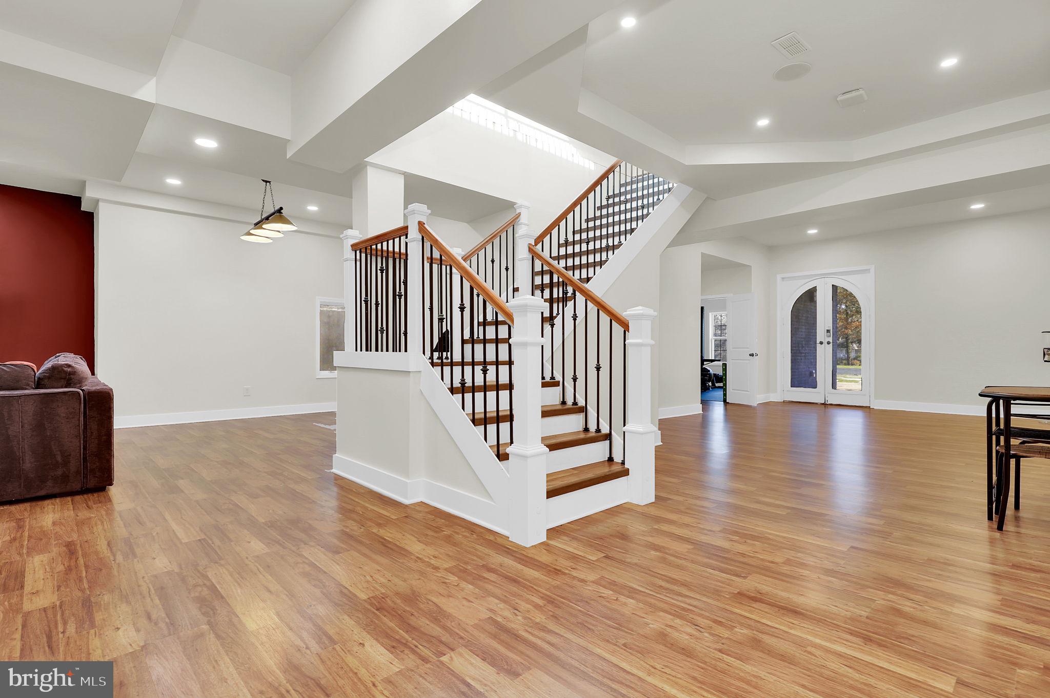 2919 Davidsonville Road Davidsonville, MD 21035 - Photo 39 of 63 a view of entryway and hall with wooden floor