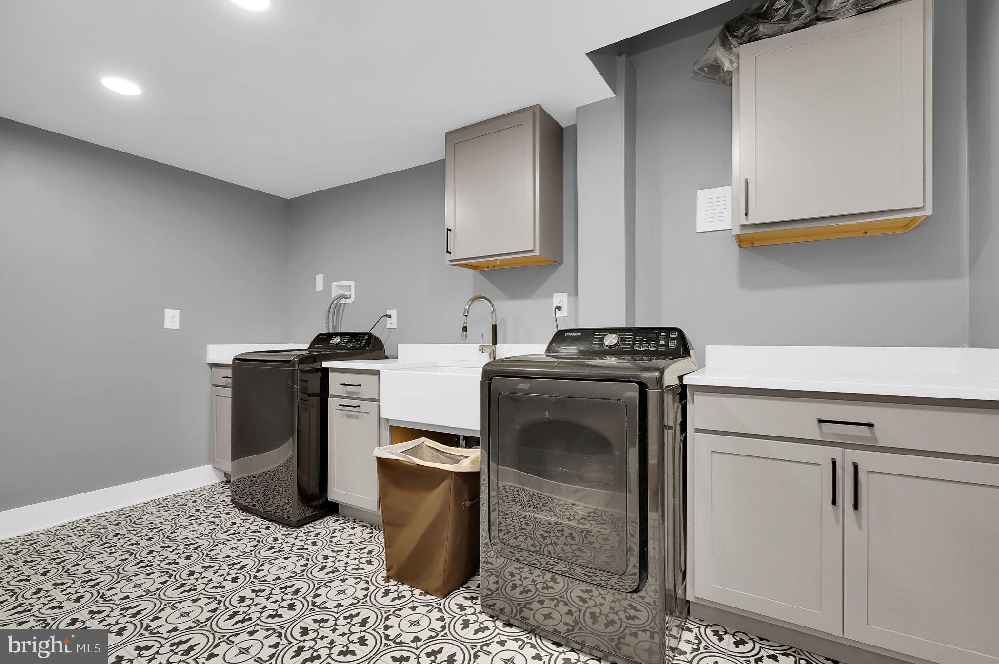 2919 Davidsonville Road Davidsonville, MD 21035 - Photo 48 of 63 a kitchen with a sink and a stove top oven