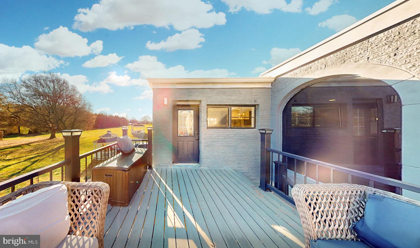 2919 Davidsonville Road Davidsonville, MD 21035 - Photo 50 of 63 a view of a balcony with wooden floor