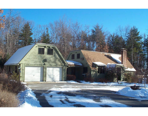 27 Lawton Road Shirley, MA 01464 - Photo 1 of 1 a front view of a house with a yard