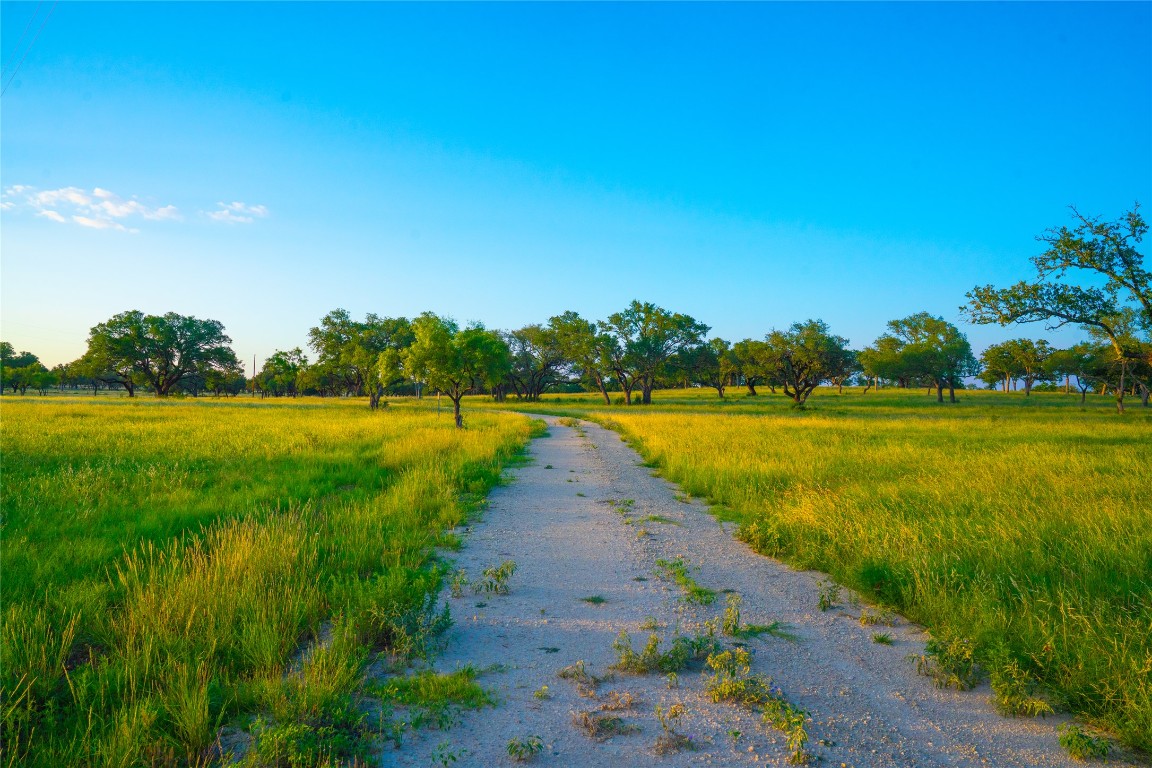 0 Rolling Oaks Ranch Johnson City, TX 78636 - Photo 30 of 30 a view of a lake with a big yard