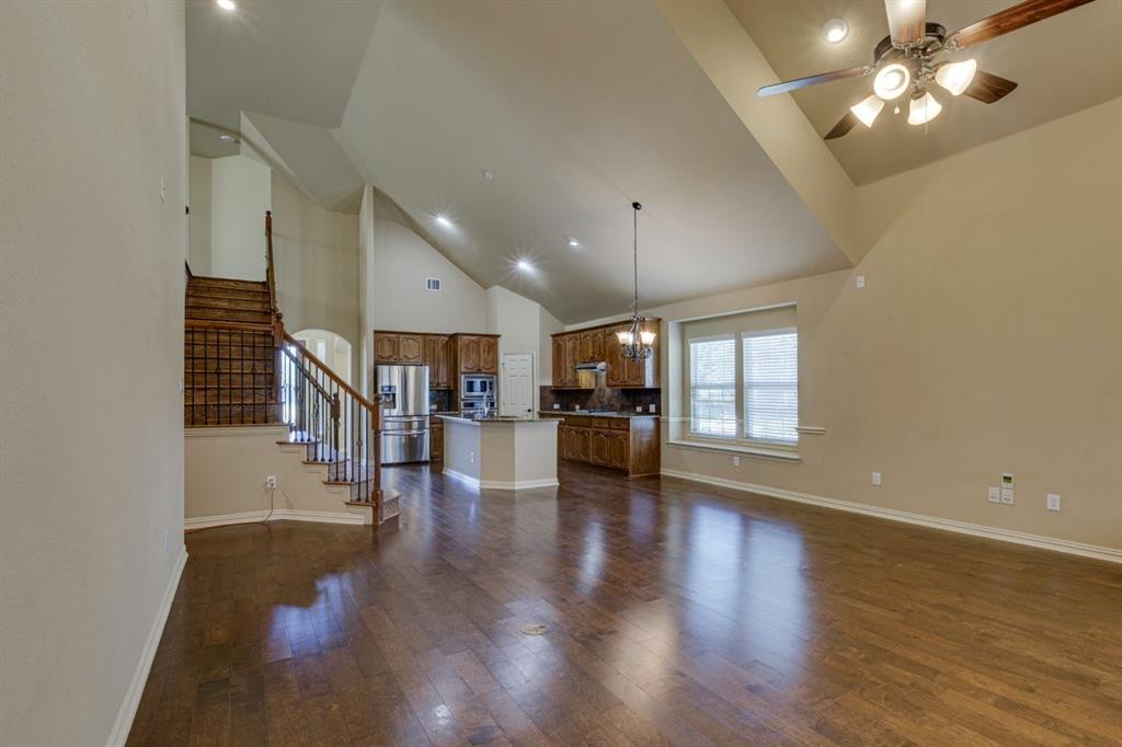 1522 Blue Jay Road Garland, TX 75043 - Photo 12 of 32 Vaulted ceiling featuring recessed lighting and a ceiling fan
