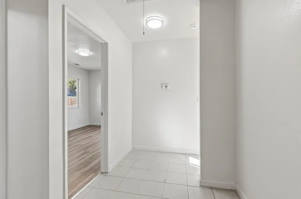 a bathroom with a sink a mirror and a toilet