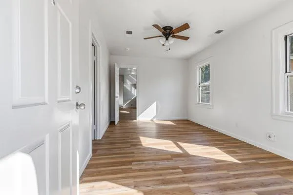 a view of an empty room and window
