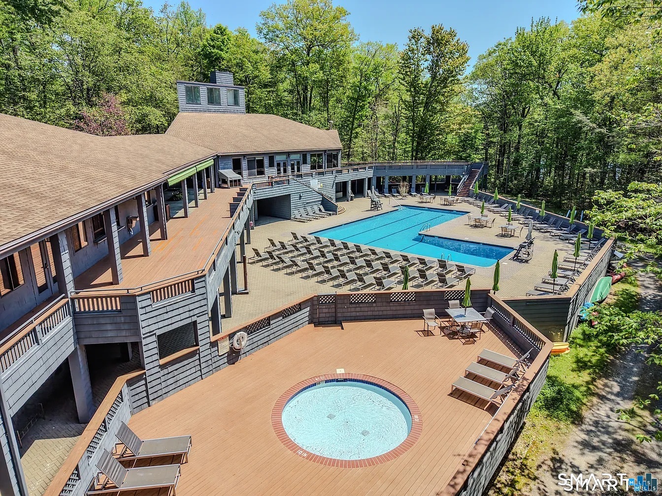 151 Old Farms, Unit 151 Torrington, CT 06790 - Photo 17 of 39 an aerial view of a house with swimming pool and furniture