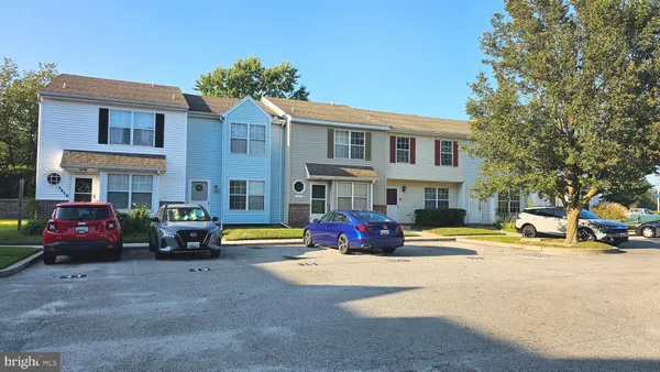 a front view of a building with street view