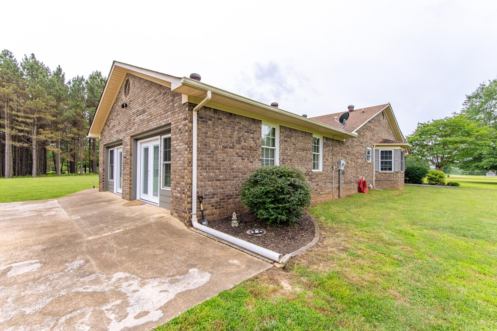 185 Baxter Road Counce, TN 38326 - Photo 12 of 40 a front view of house with yard and green space