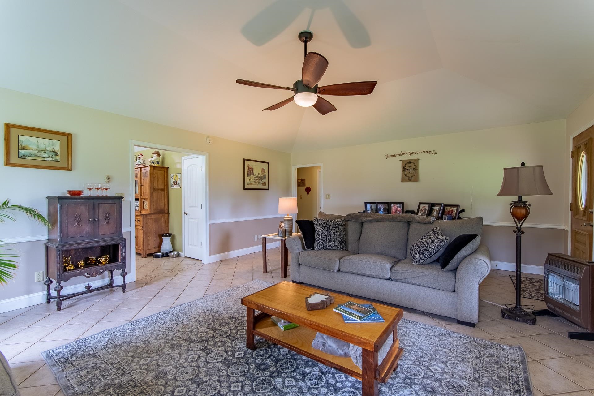 185 Baxter Road Counce, TN 38326 - Photo 21 of 40 a living room with furniture and a dining table