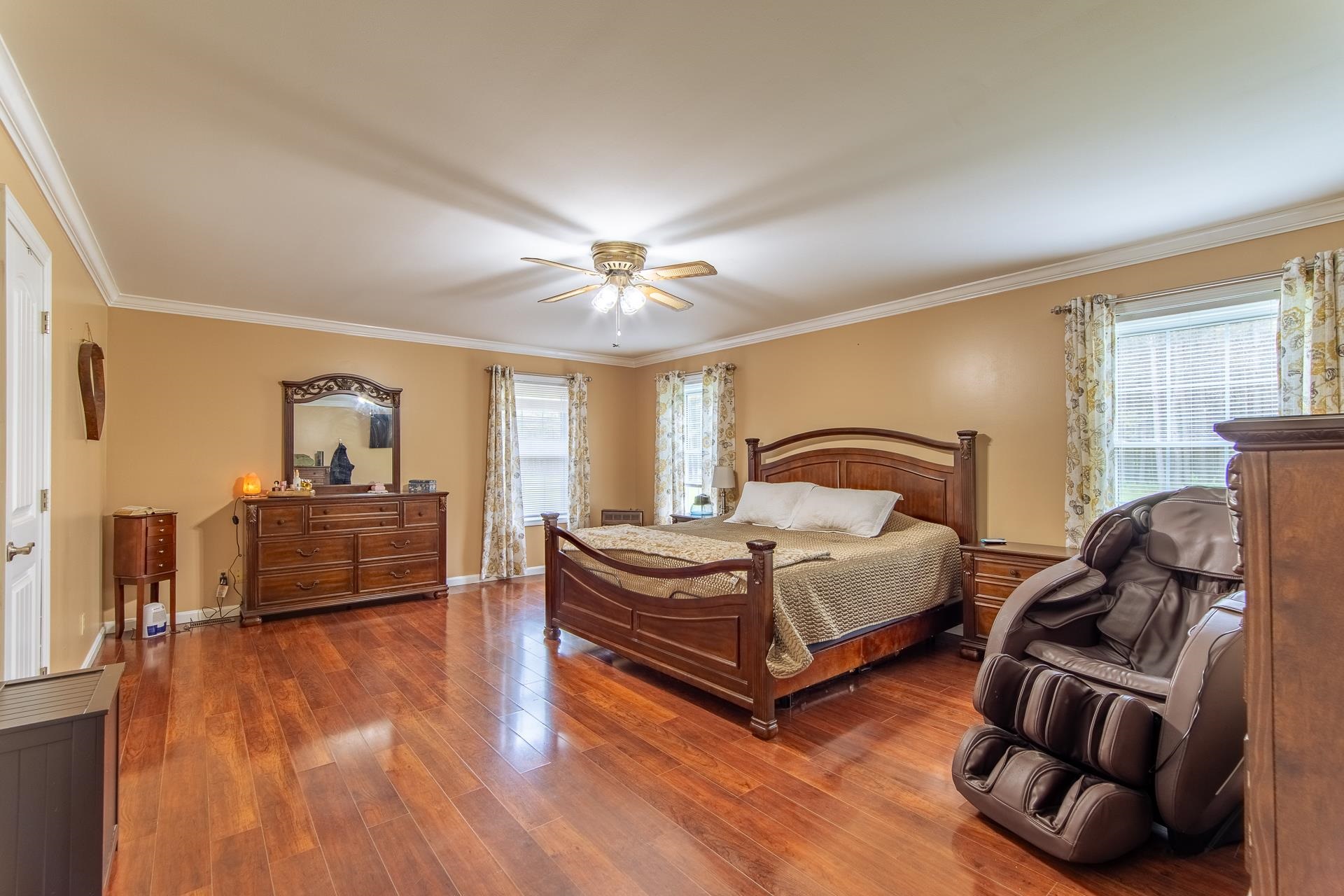 185 Baxter Road Counce, TN 38326 - Photo 24 of 40 a bedroom with furniture and a wooden floor