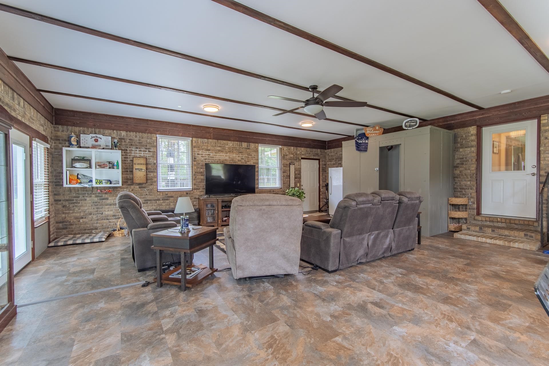 185 Baxter Road Counce, TN 38326 - Photo 28 of 40 a living room with furniture and a large window