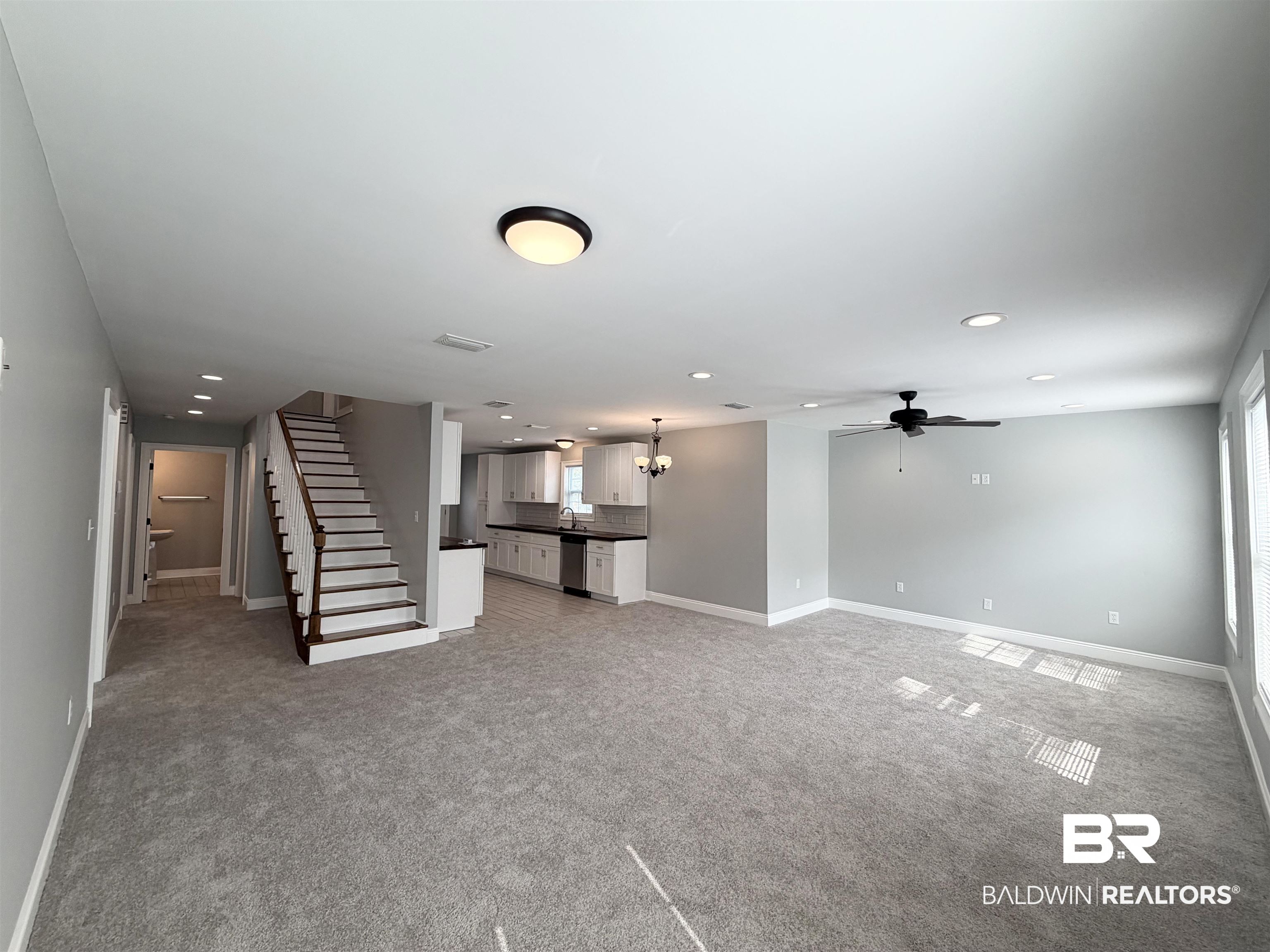 2454 Taylor Avenue Mobile, AL 36606 - Photo 22 of 24 Unfurnished living room with light colored carpet, recessed lighting, and a ceiling fan