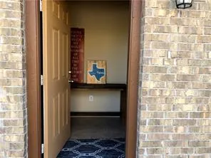 a living room with a couch and a flat screen tv