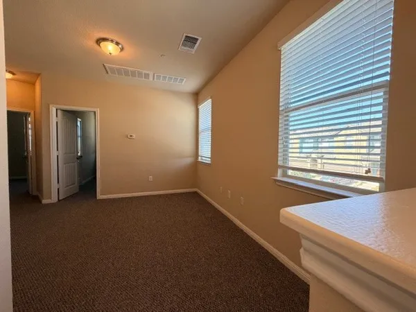a view of a livingroom with a staircase